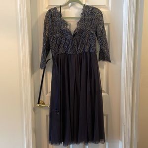 Mother of the bride dress. Worn once. Has built in bra.